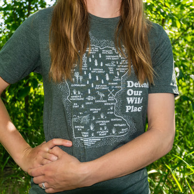 Woman wearing Defend Minnesota's Wild Places T-shirt